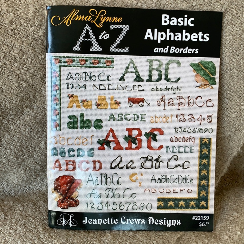 Brand new cross stitch alphabet and border book